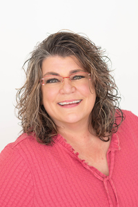 Suzanne Mitchell, MAS, is the President and Matriarch of Zamar Screen Printing, Inc. serving the greater Denver metro area with promotional items, corporate apparel and gifts